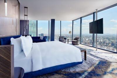 Presidential suite bedroom with city view