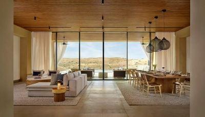 Living room with dining table and mini bar cabinet
