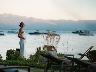 A woman looks out over Lake Tahoe