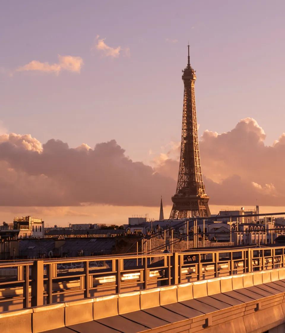 Night view of the illuminated Eiffel Tower, from the private terrace of the Hotel du Collectioneur in Paris.