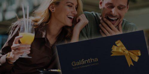 Photo: Smiling people and an illustration of a gift voucher