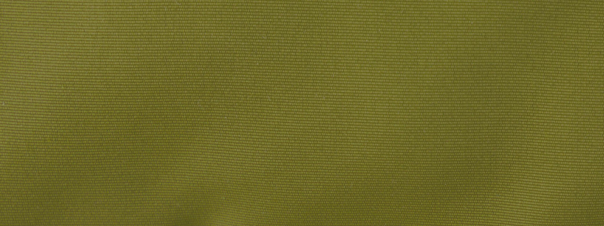 Close-up of green textured fabric with fine horizontal stripes, reminiscent of the elegant furnishings found at Suncadia Resort in Washington.