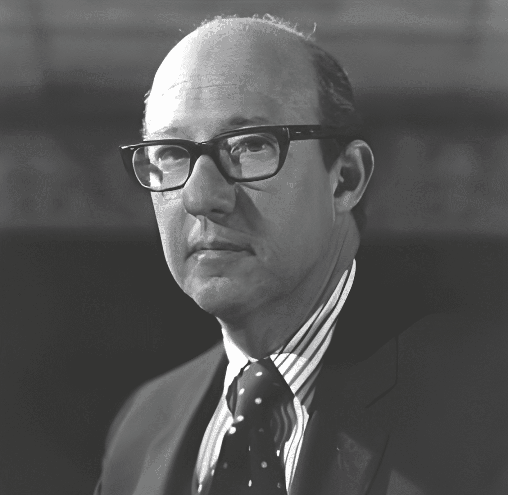 a man wearing a hat and glasses