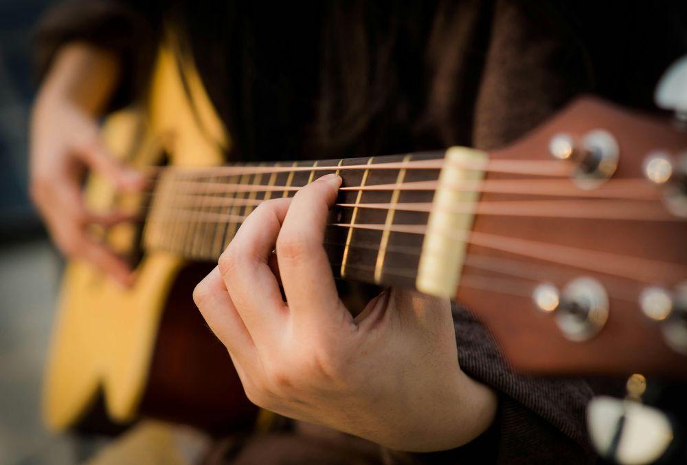 Man playing a guitar